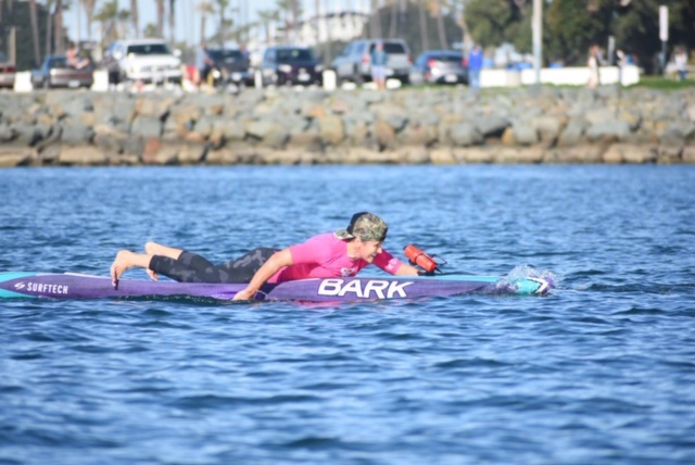 Tammy Harbison, owner of Elite Feet USA racing on her stand up paddleboard
