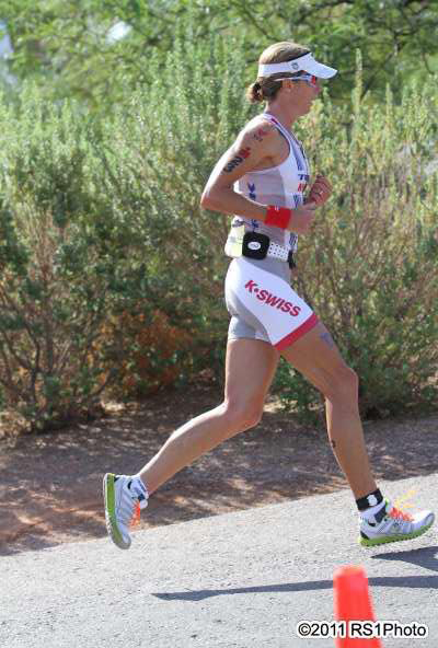 Julie Dibens Triathlete, olympic champ running wearing custom foot orthotics by Elite Feet USA